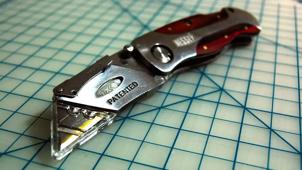 What is a utility knife used for in construction?